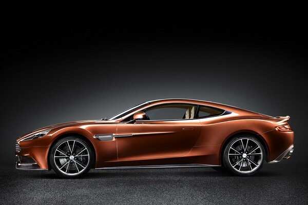 Aston martin on a black background