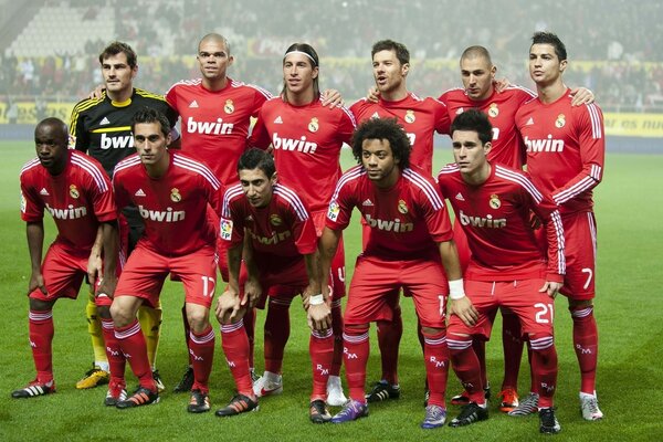 Foto do time de futebol no estádio