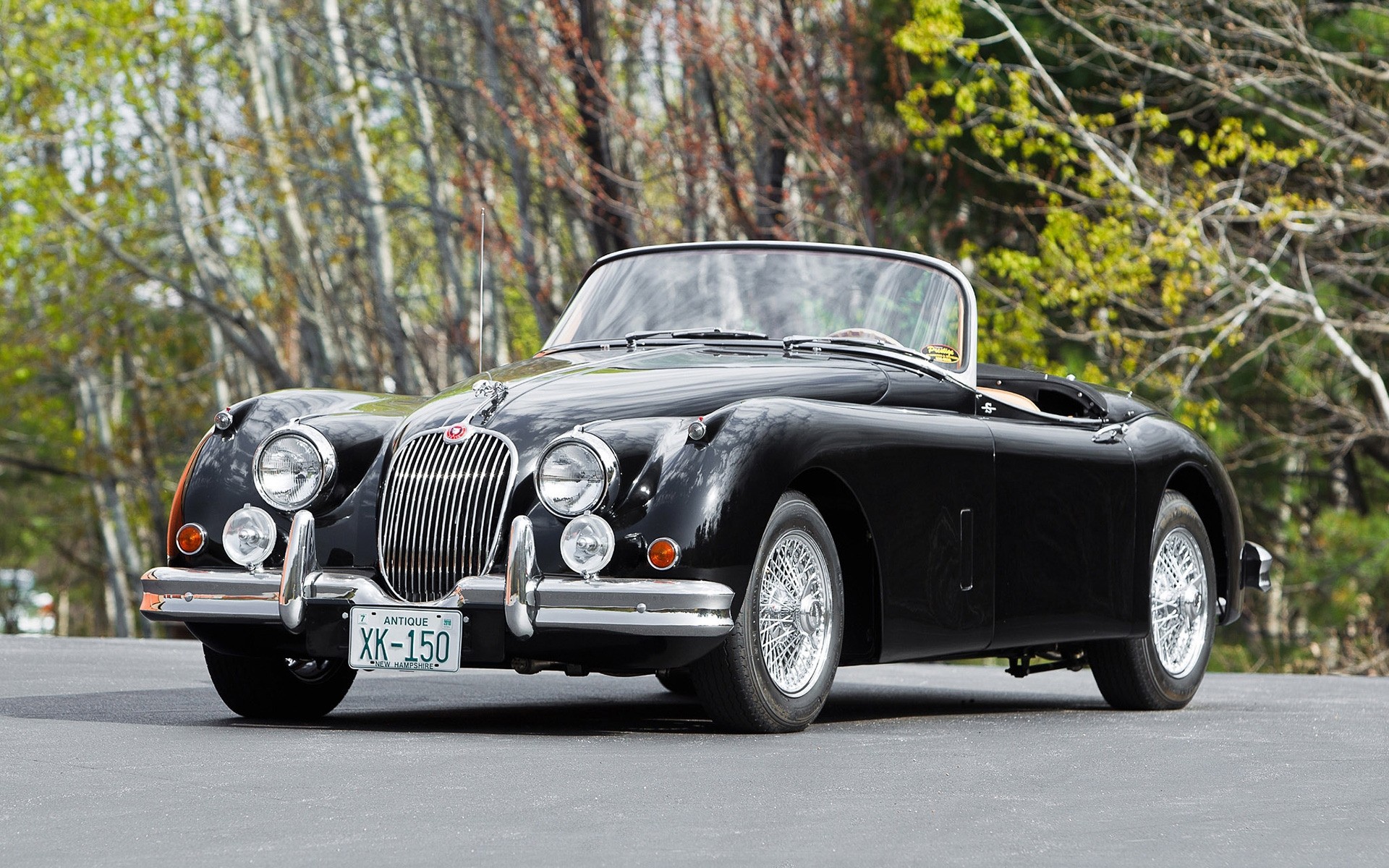 classic / old cars voiture voiture disque système de transport roues asphalte chaussée cabriolet automobile rapide noir classique capot jaguar xk