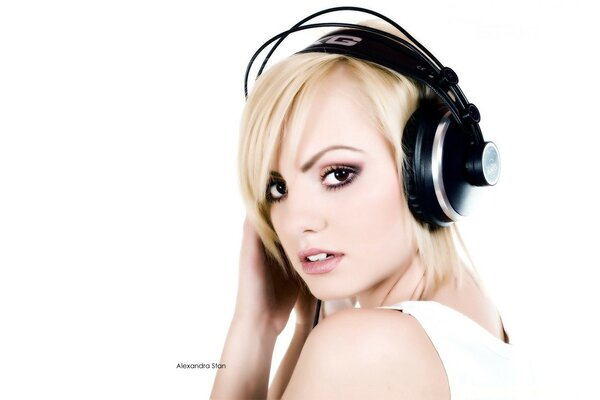 Beautiful blonde in headphones