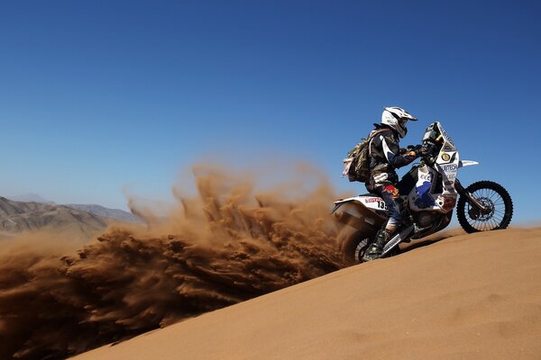 Motorcycle racer on the sand