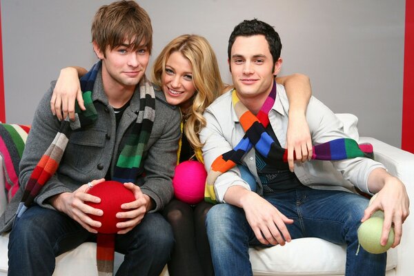 A cheerful company of young people on the couch