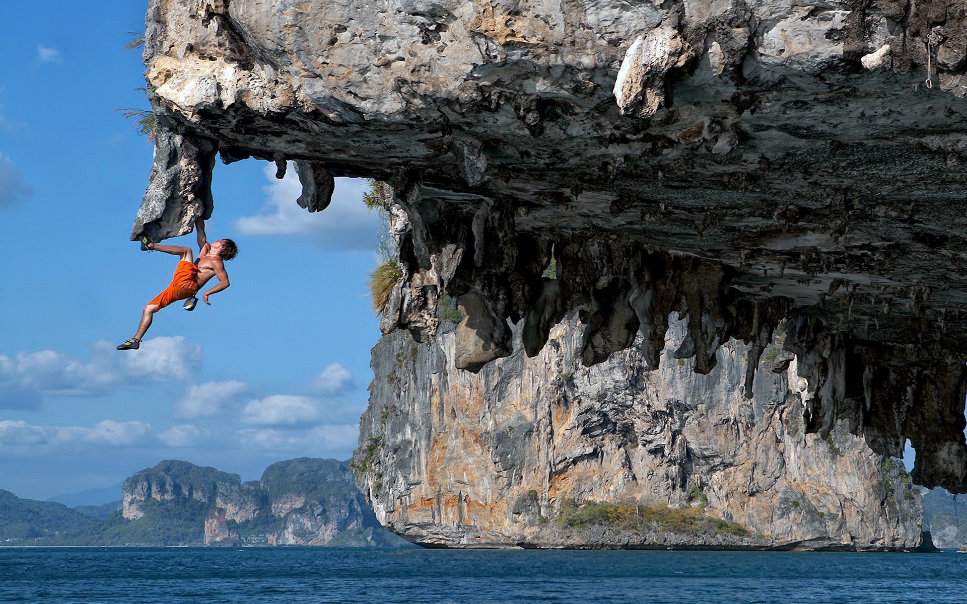 climbing water rock outdoors seashore nature travel sea cave ocean landscape daylight recreation vacation adventure tourism scenic geology blue rocks man