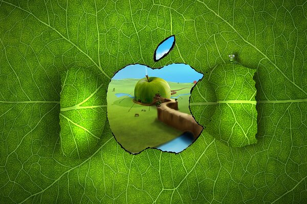 The apple logo is decorated in green leaves