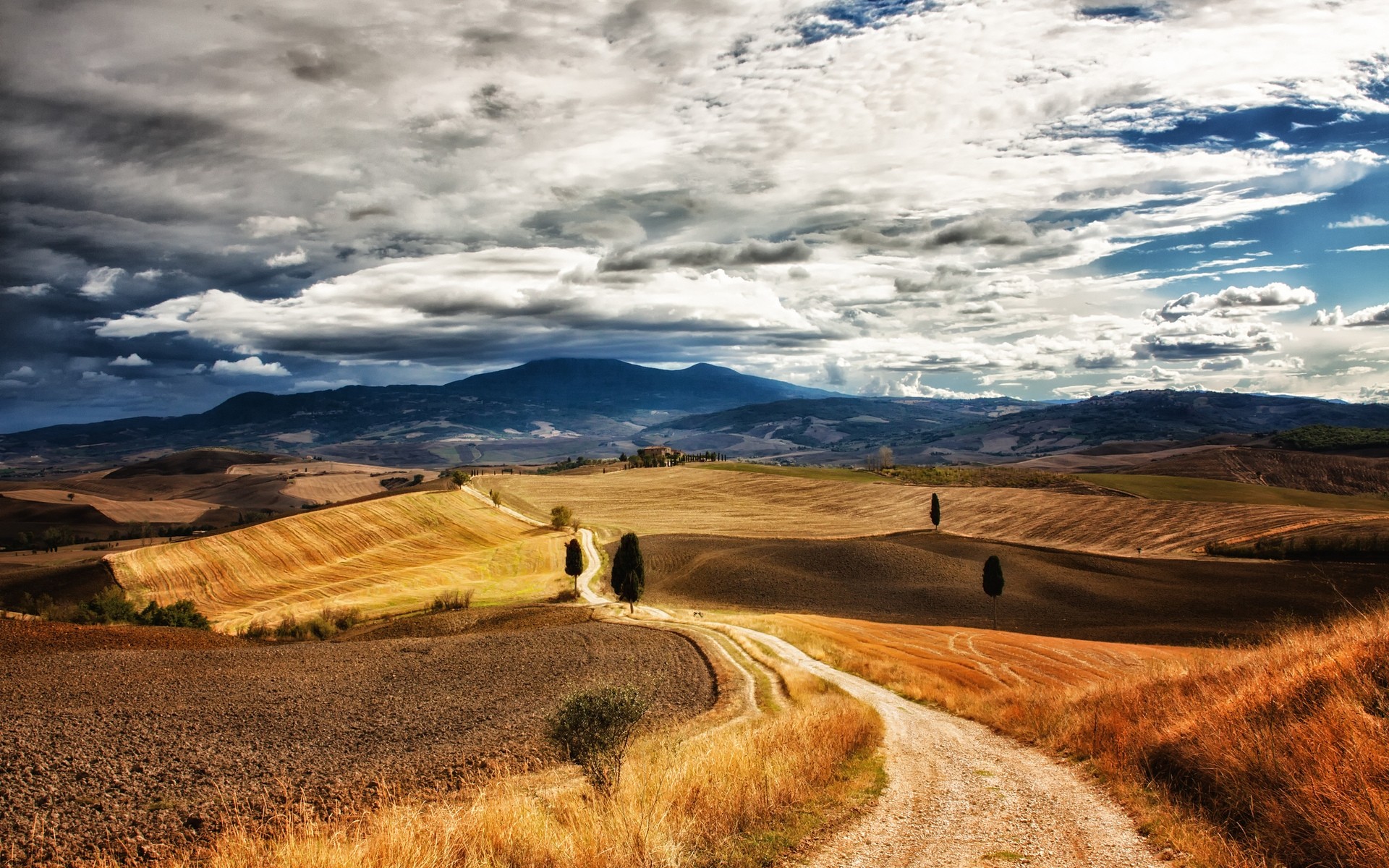 itália paisagem deserto céu viajar natureza seco ao ar livre cênica pôr do sol montanhas rocha estéril amanhecer estrada areia colina arid toscana toscana fundo