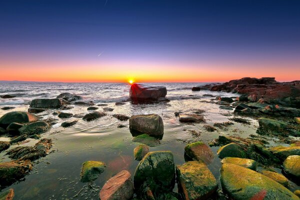 Coastal stones of the evening sea