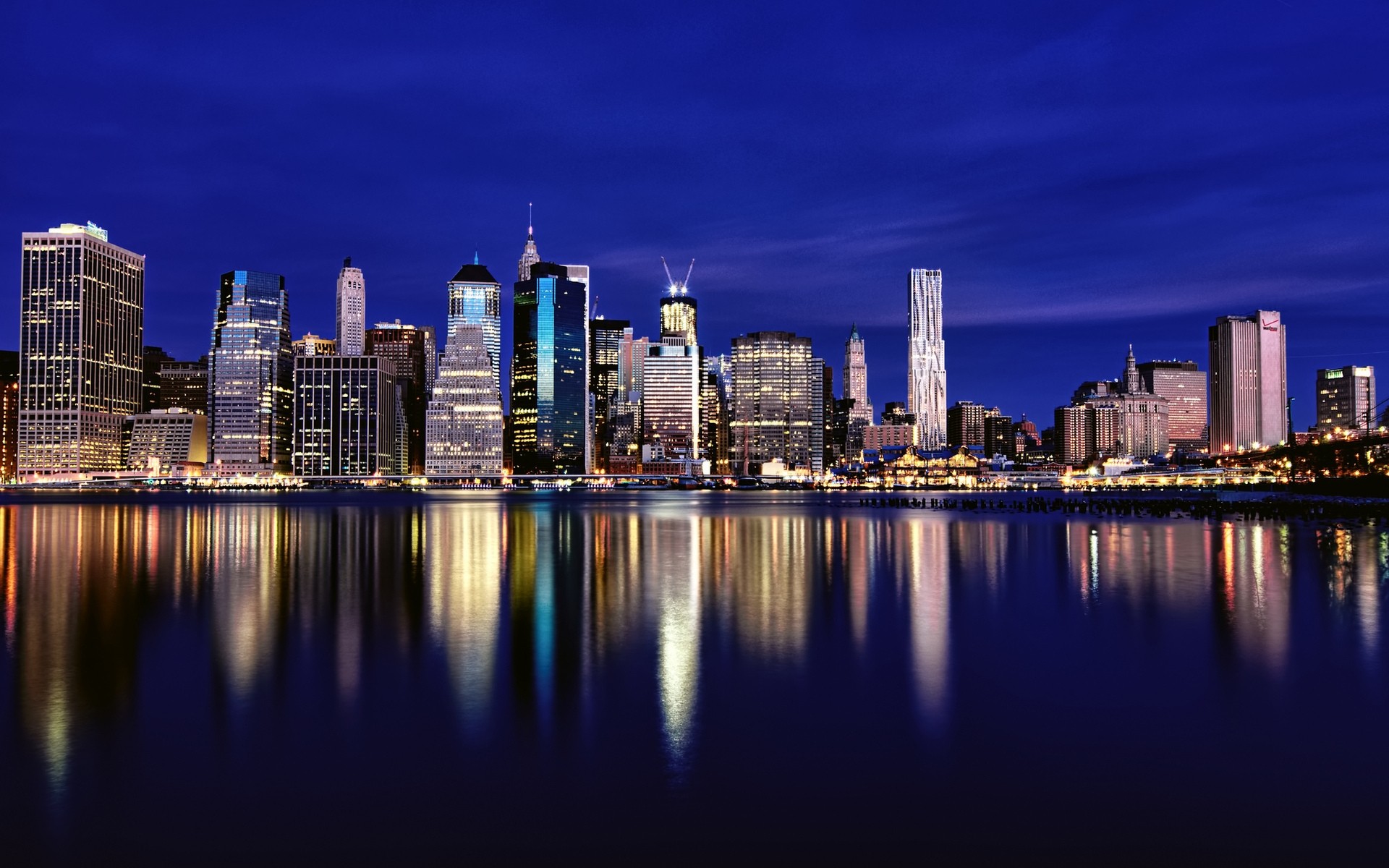 eua cidade skyline arranha-céu cidade arquitetura centro da cidade escritório casa crepúsculo beira-mar céu reflexão água viagens rio urbano moderno negócios finanças noite lago nova york paisagem fundo de nova york nova york foto