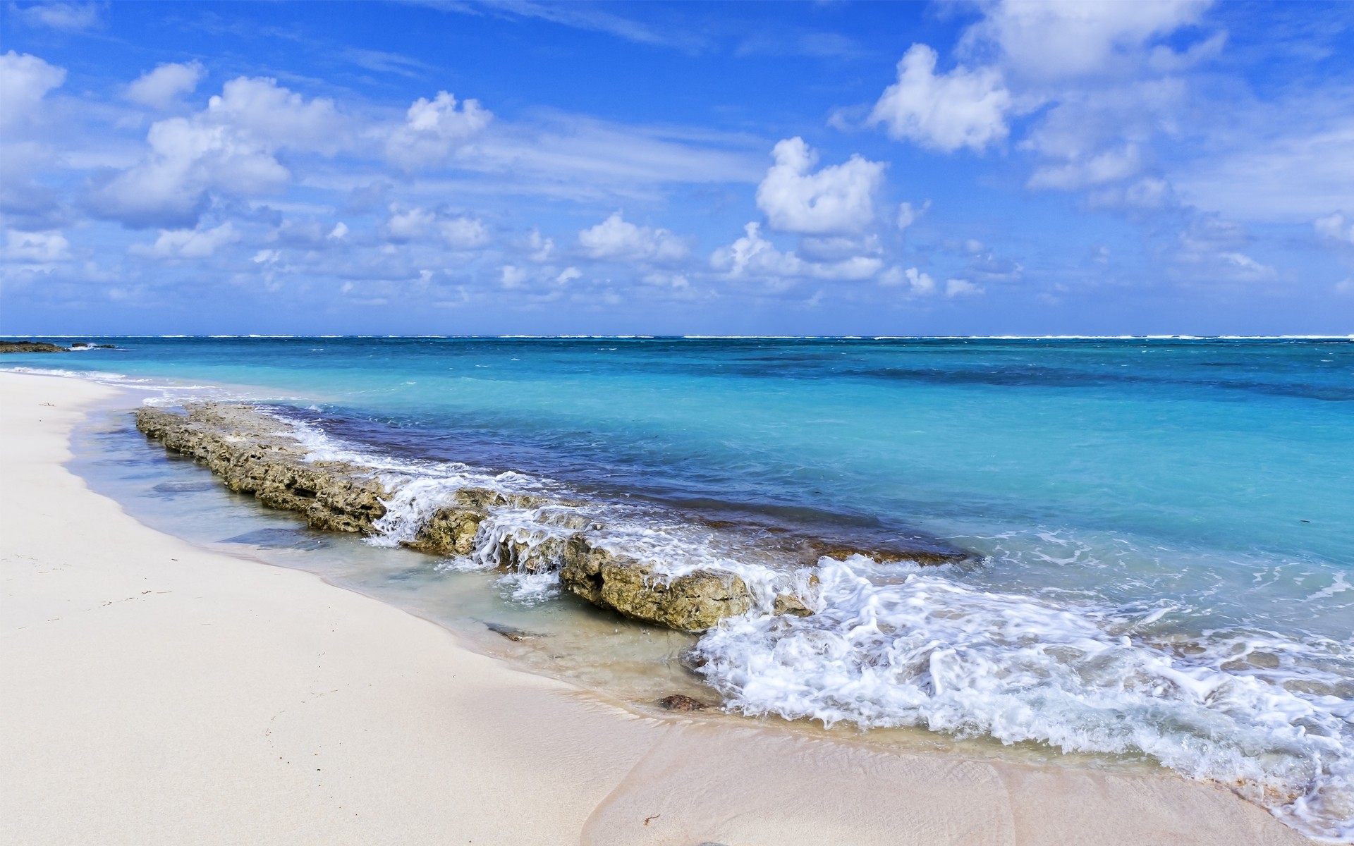 summer sand beach water seashore sea ocean tropical travel surf seascape fair weather wave sky vacation relaxation nature island sun ocean waves sea waves blue sky