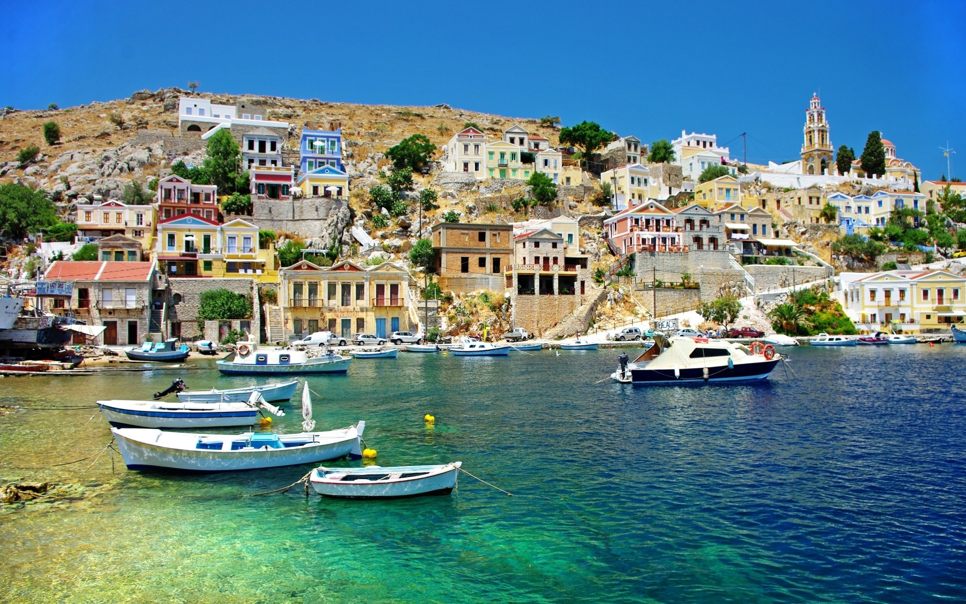 greece sea boat seashore harbor travel town water tourism port vacation watercraft yacht city marina coastal house destination sight seaside bay boats landscape hills