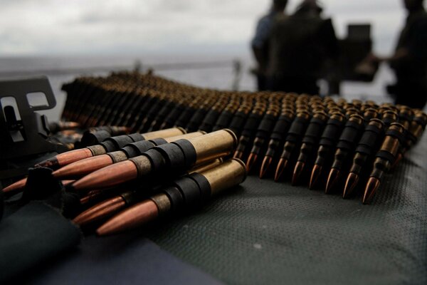 Machine gun belts with cartridges, ammunition, ammunition