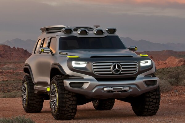 Mercedes SUV on the desert background