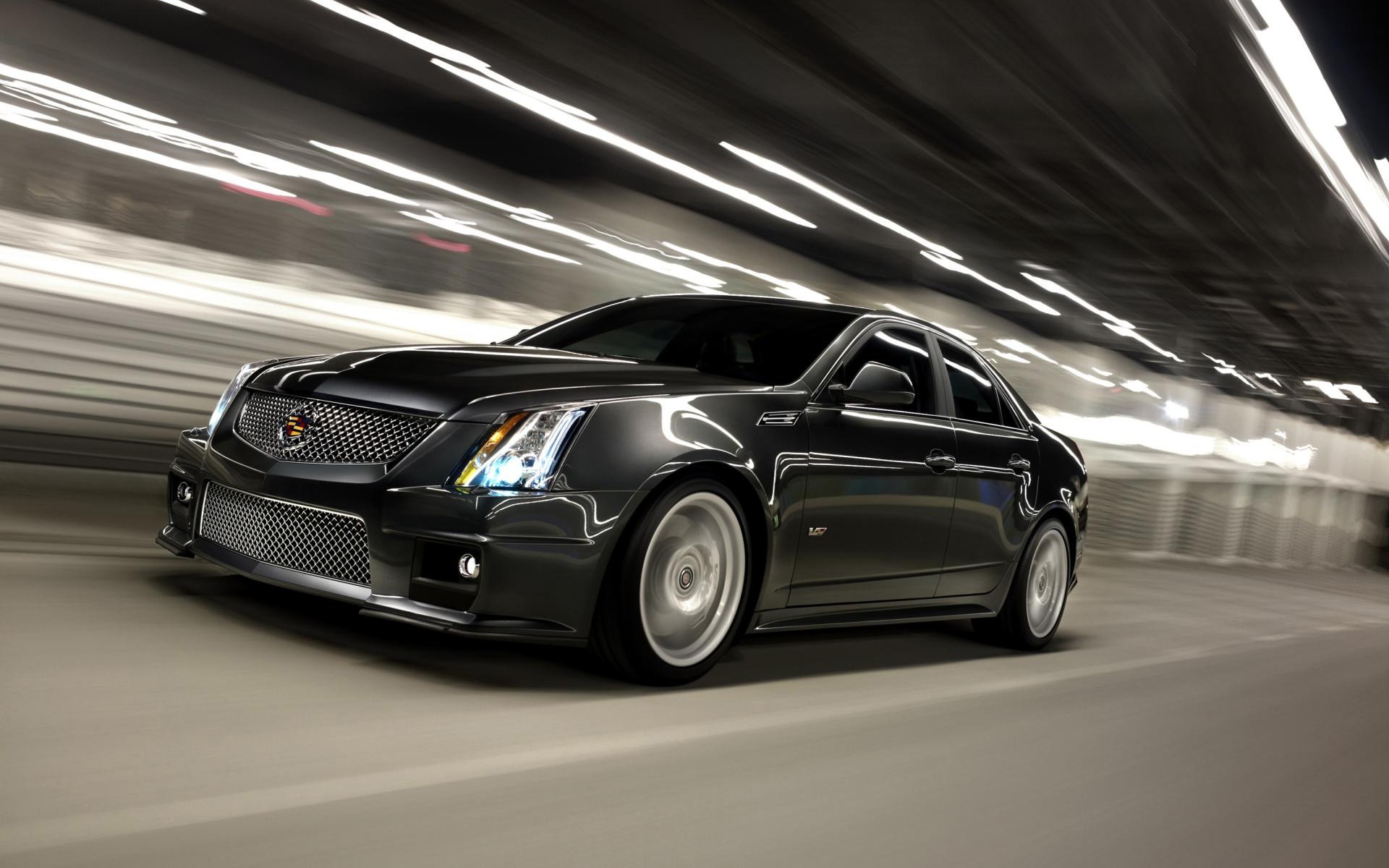 cadillac coche vehículo sistema de transporte rápido acera automotriz desenfoque asfalto prisa ruedas coupé negro velocidad cadillac cts