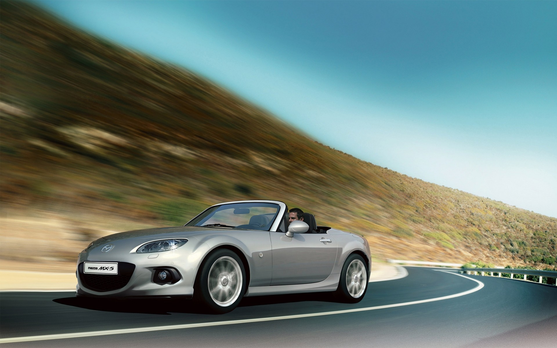 mazda car asphalt blacktop pavement vehicle hurry blur action noon road fast transportation system mazda mx 5