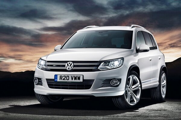 Volkswagen car on the background of a beautiful stormy sky