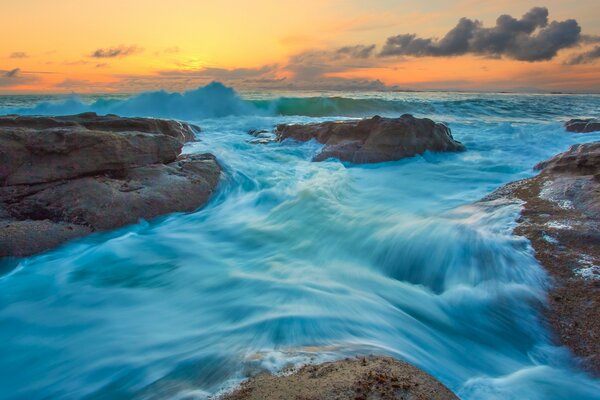 Beautiful blue current through boulders