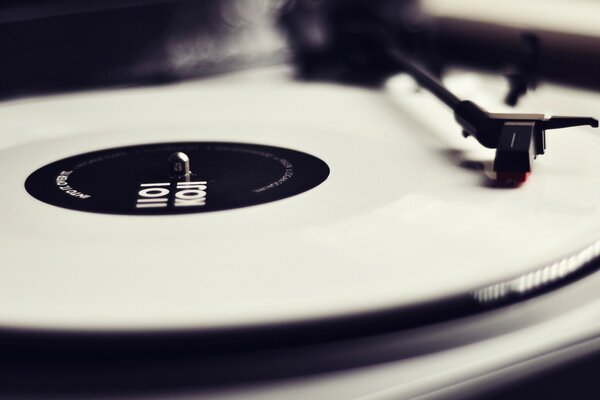 Photo of a stereo player with a white disc