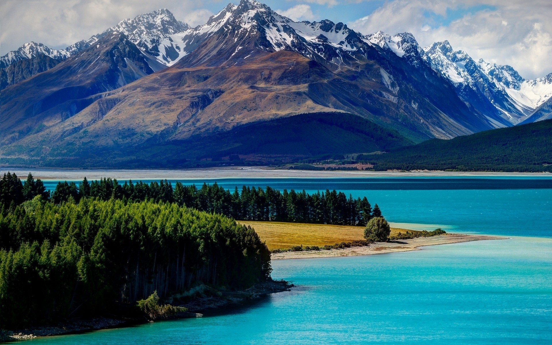 other city water mountain travel lake scenic landscape reflection snow outdoors sky nature daylight