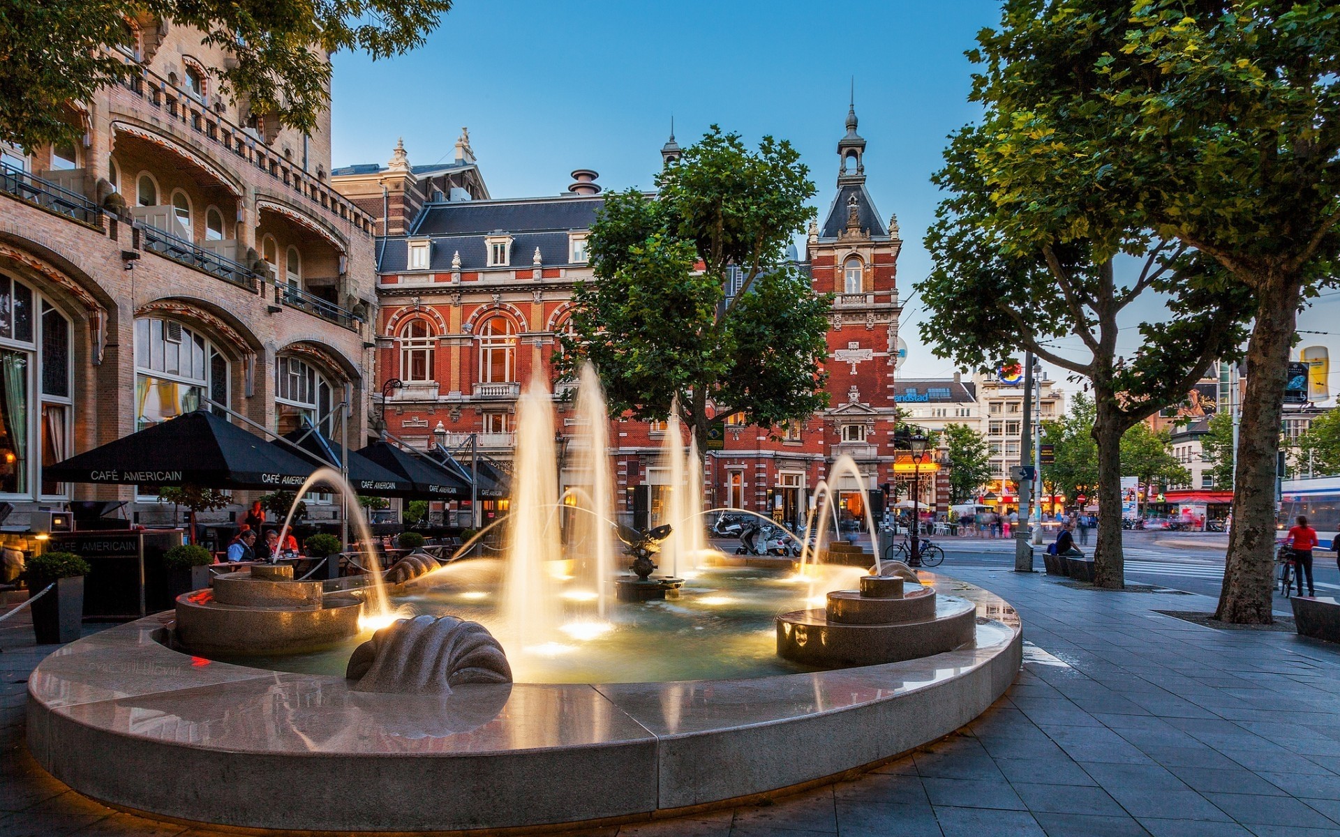 other city architecture travel city building fountain tourism outdoors street town square urban sky water tourist vacation old house landmark sight amsterdam