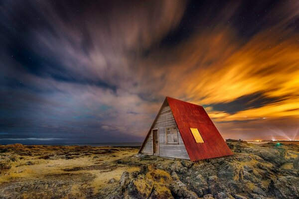 A lonely hut far from civilization, where it s cool to meet the dawn