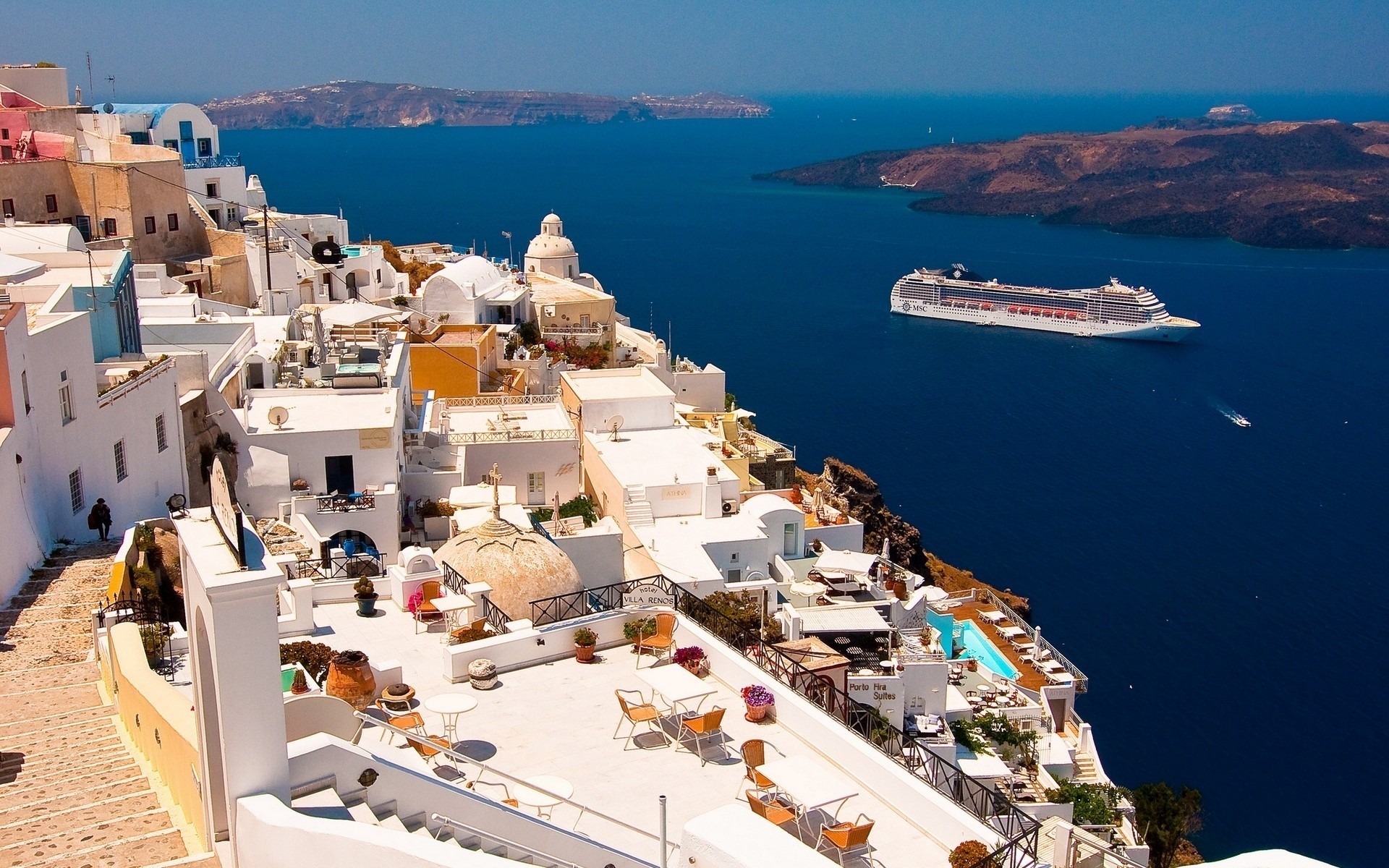 greece sea seashore travel harbor water watercraft city town architecture ship yacht port cityscape marina tourism bay transportation system vacation ocean santorini landscape aegean sea