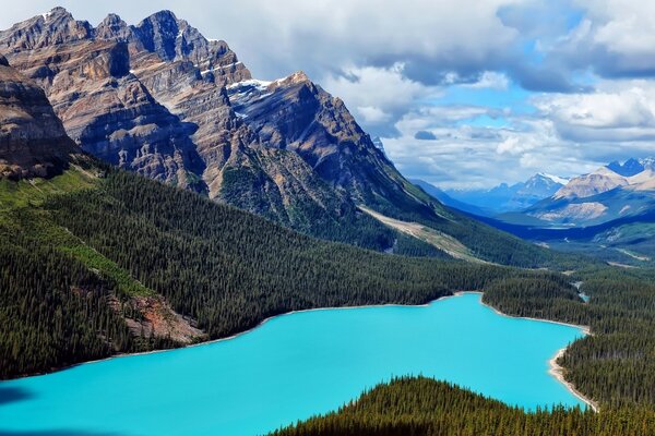 Blue lake lying at the foot of the mountain