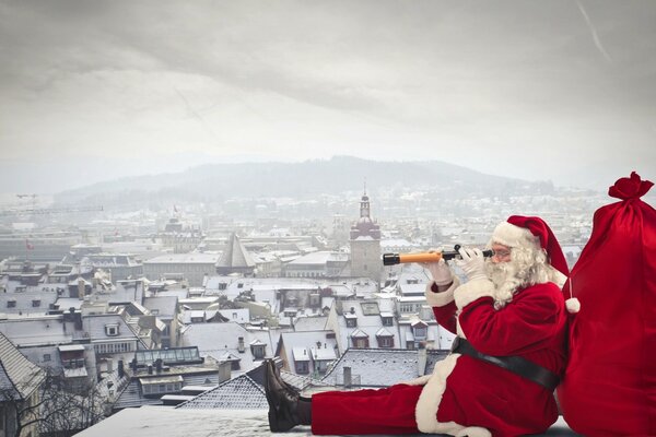 Winter landscape. Santa Claus with gifts