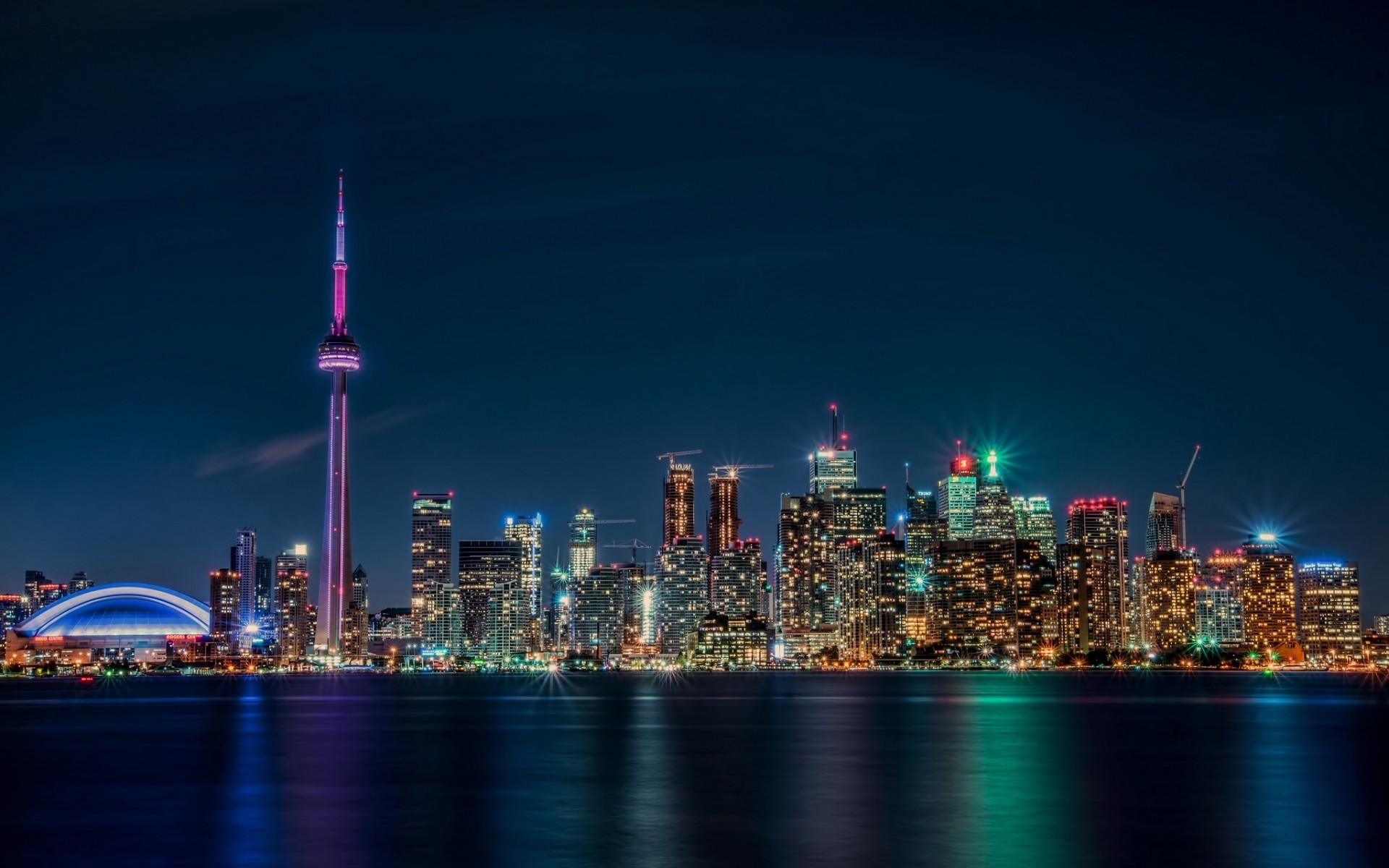 altre città città skyline città architettura grattacielo centro crepuscolo cielo torre casa affari finanza sera ufficio alto viaggi fiume punto di riferimento urbano illuminato ontario lago paesaggio