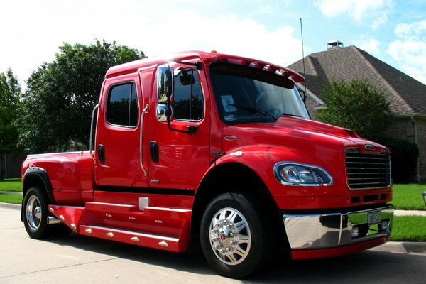 Special equipment is parked at the sidewalk