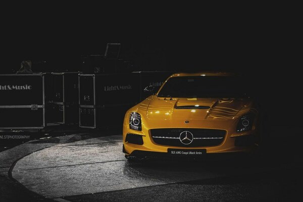 Yellow Mercedes Benz with dimmed light