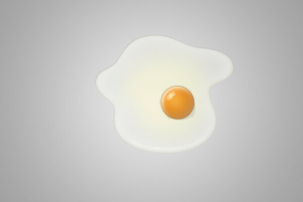 Scrambled eggs on a gray background in the center