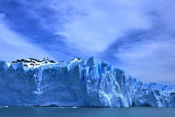 Mountainous icebergs over the ocean