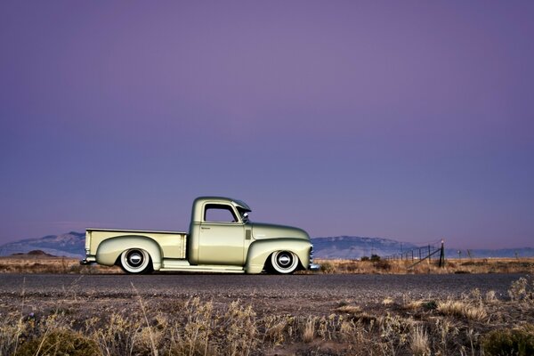 A truck on a country road alone