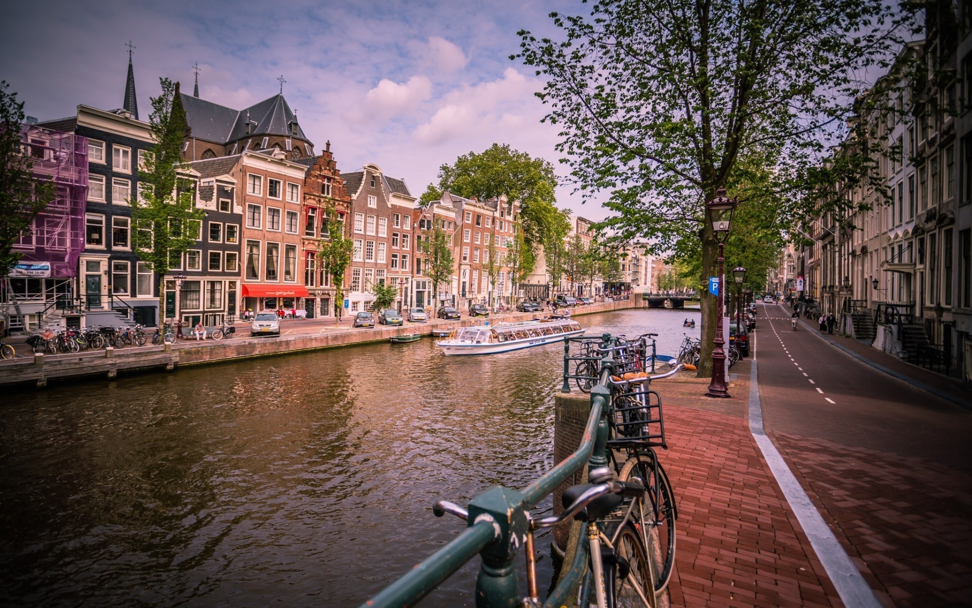 other city canal city architecture building travel water river street urban town bridge house tourism outdoors old sight reflection sky amsterdam landscape boat