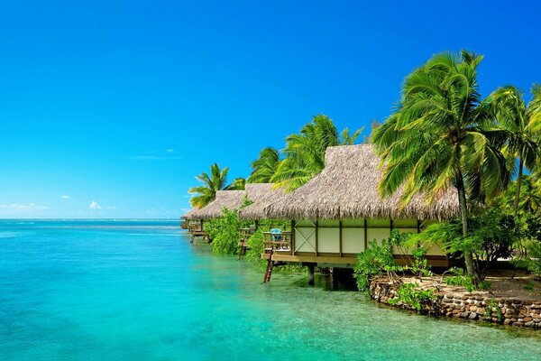 Exotic bungalows jutting into the sea