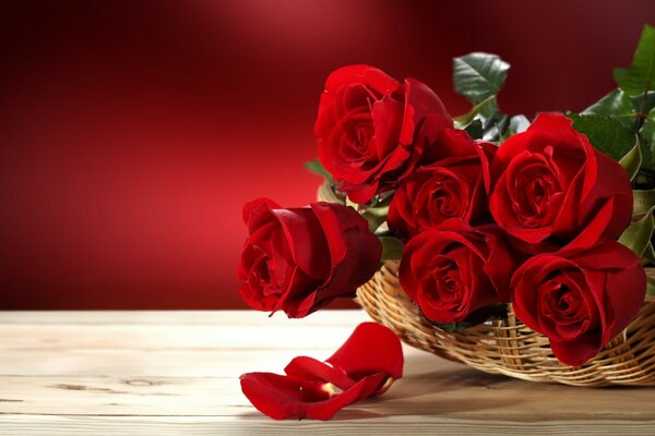 Bouquet of red roses in a basket