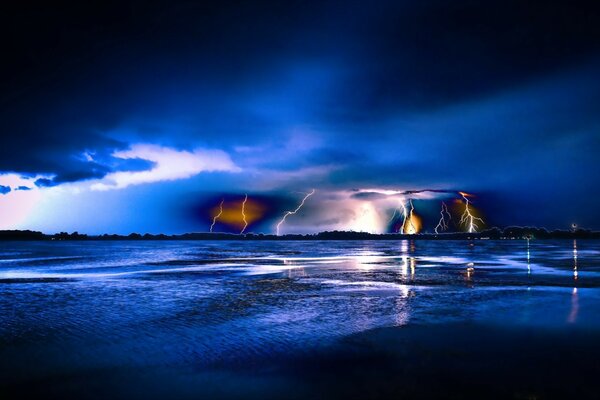 Thundercloud with lightning over the water