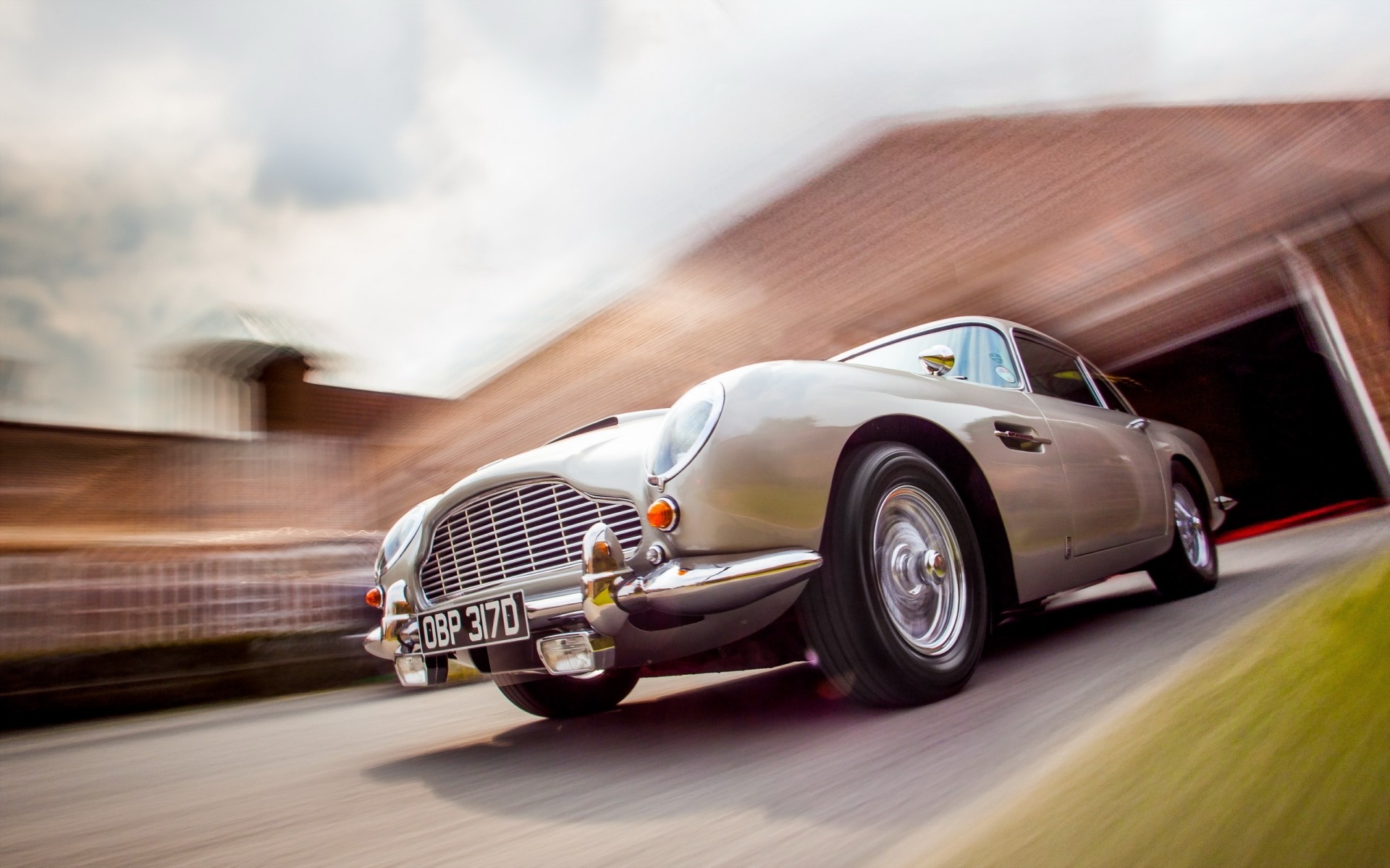 aston martin car vehicle fast transportation system asphalt hurry blur drive race action pavement road wheel retro aston martin classic aston martin vintage aston martin classic cars old cars