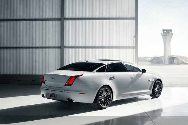 White Jaguar car in the garage