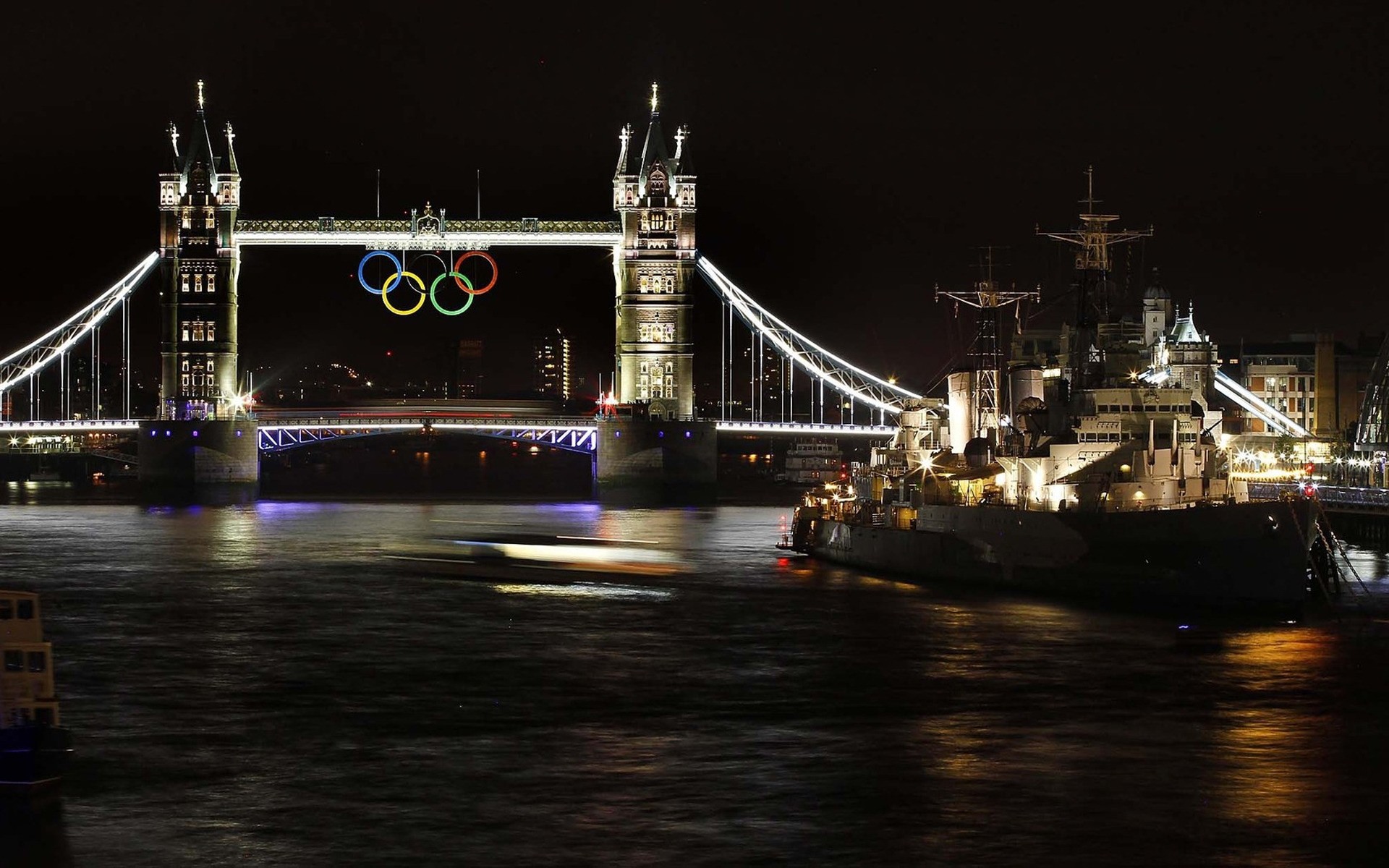 olympic games bridge water river travel transportation system city drawbridge vehicle dusk architecture evening ship building urban watercraft light sky sunset commerce england athlete tamisa