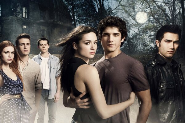 Young people on the background of the house and the moon from the TV series