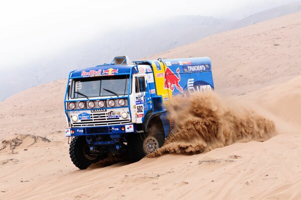 Truck in sand and dust