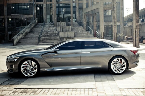 Grey Citroen on a background of grey walls