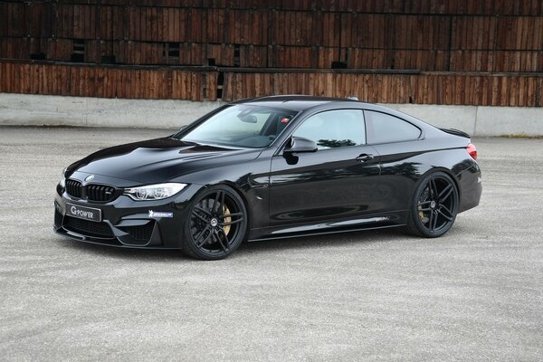 A beautiful black car with a nice shade