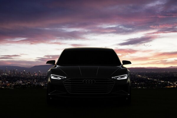 Voiture Audi et coucher de soleil chic