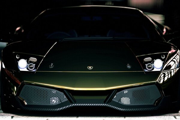 Green sports car with grilles