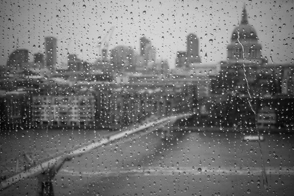 Retro photo of the city bridge rain