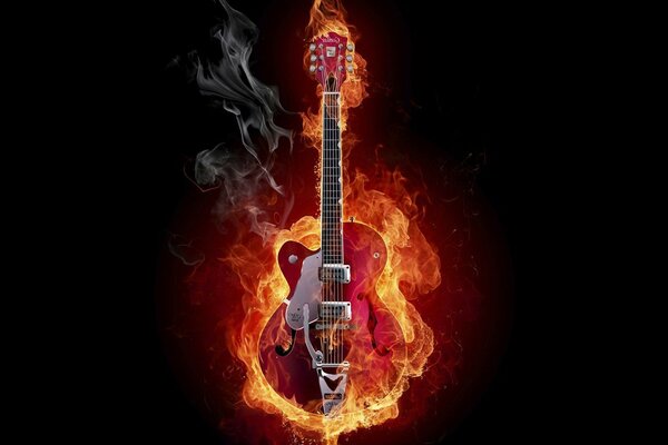 Guitare de feu sur fond noir Photoshop