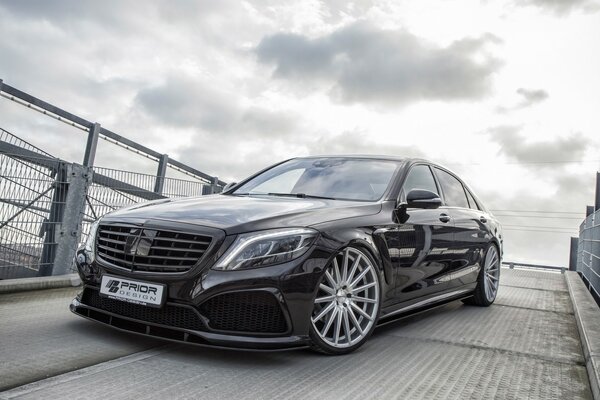 Black Mercedes Benz with stylish wheels