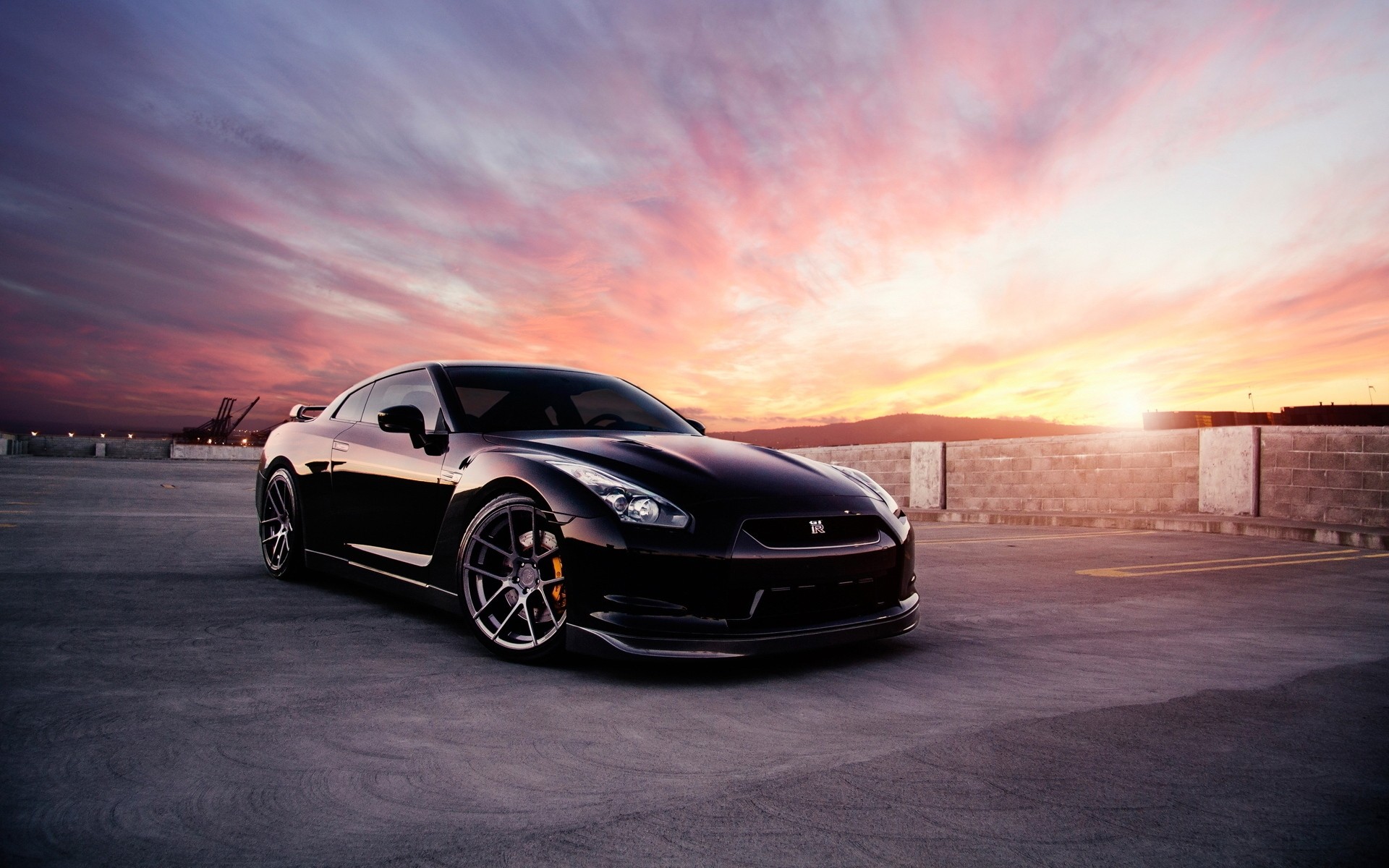 nissan car vehicle asphalt pavement blacktop sunset transportation system noon hurry gt-r