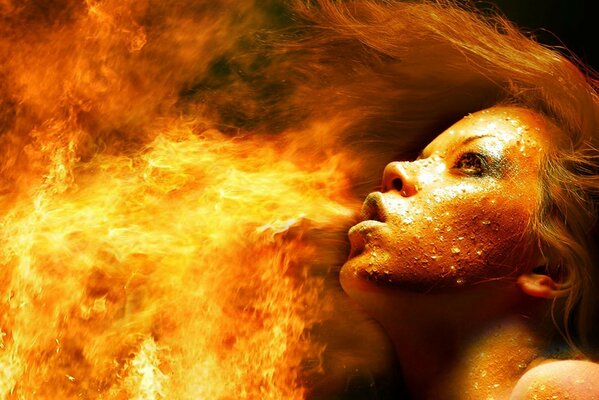 A girl spewing flames. Terribly beautiful